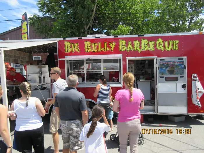 Big Belly BBQ truck serving a crowd